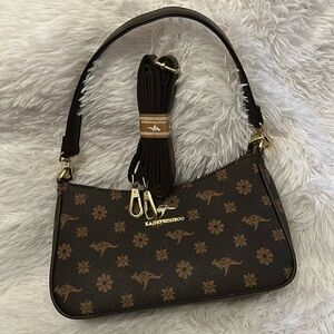 Woman’s hand & Crossbody  bag